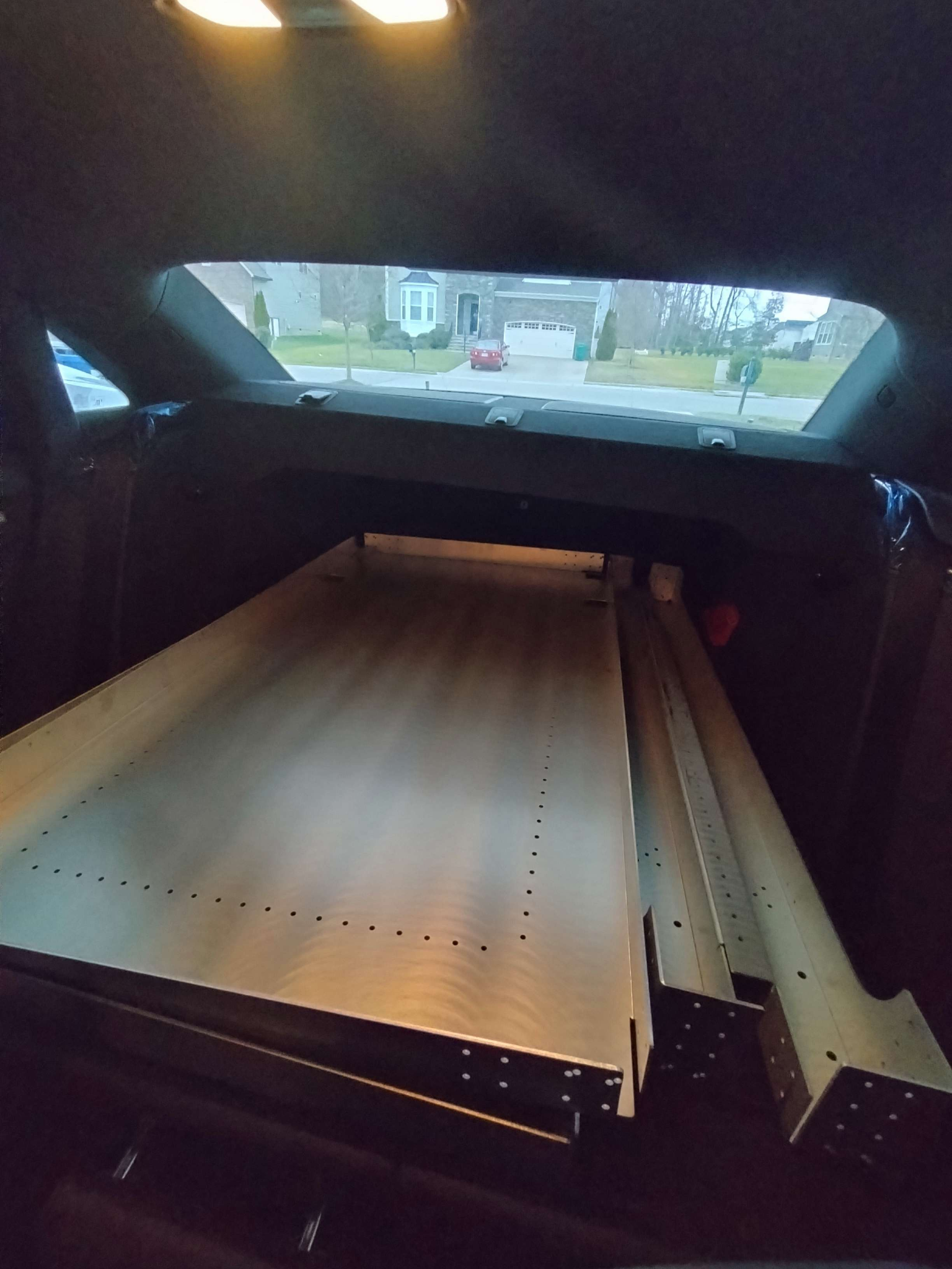 Laser-cut and brake-formed panels flat-packed for transport.