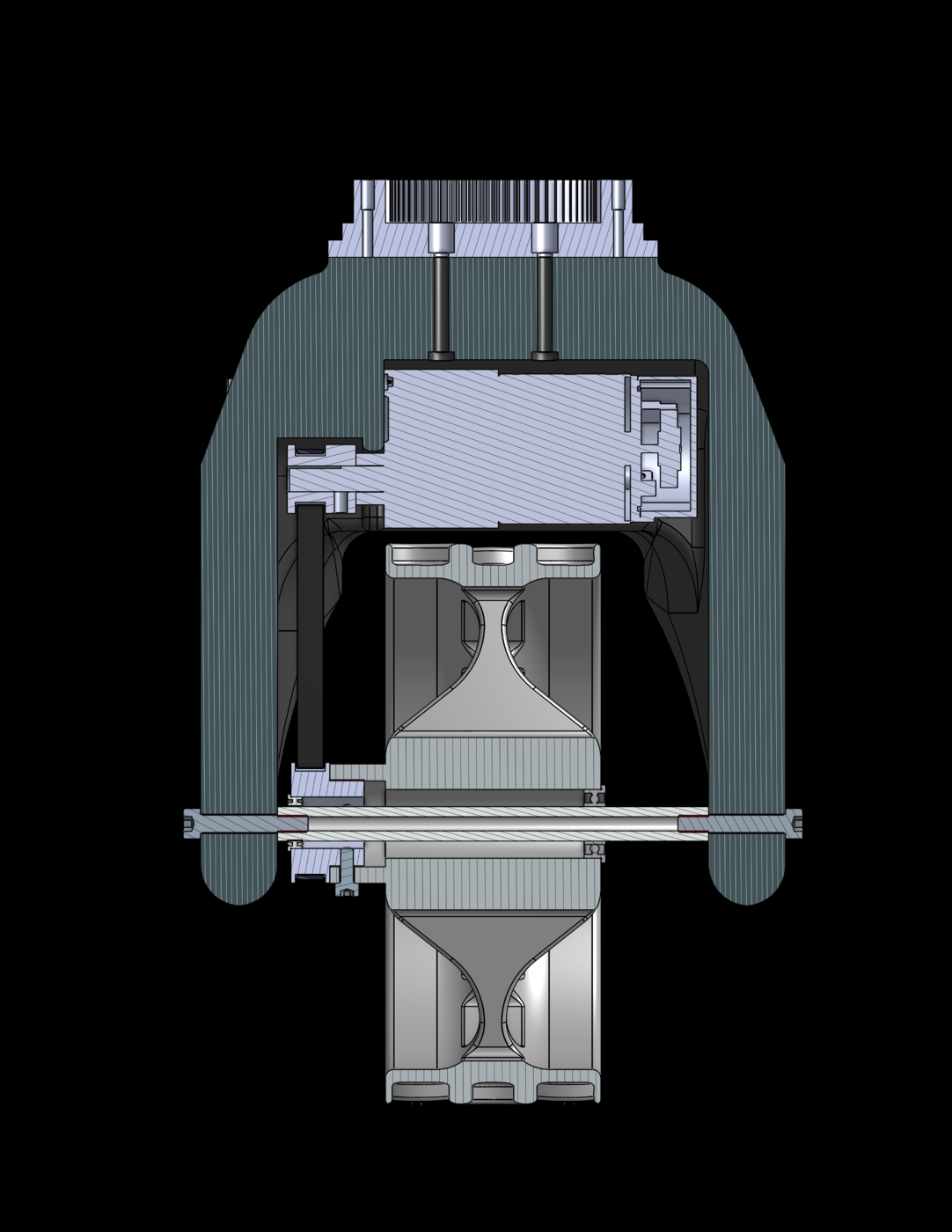 Sectioned CAD view through one wheel and drive module, showing the internal packaging of the drive hardware, shafts, bearings, structure, and wheel.